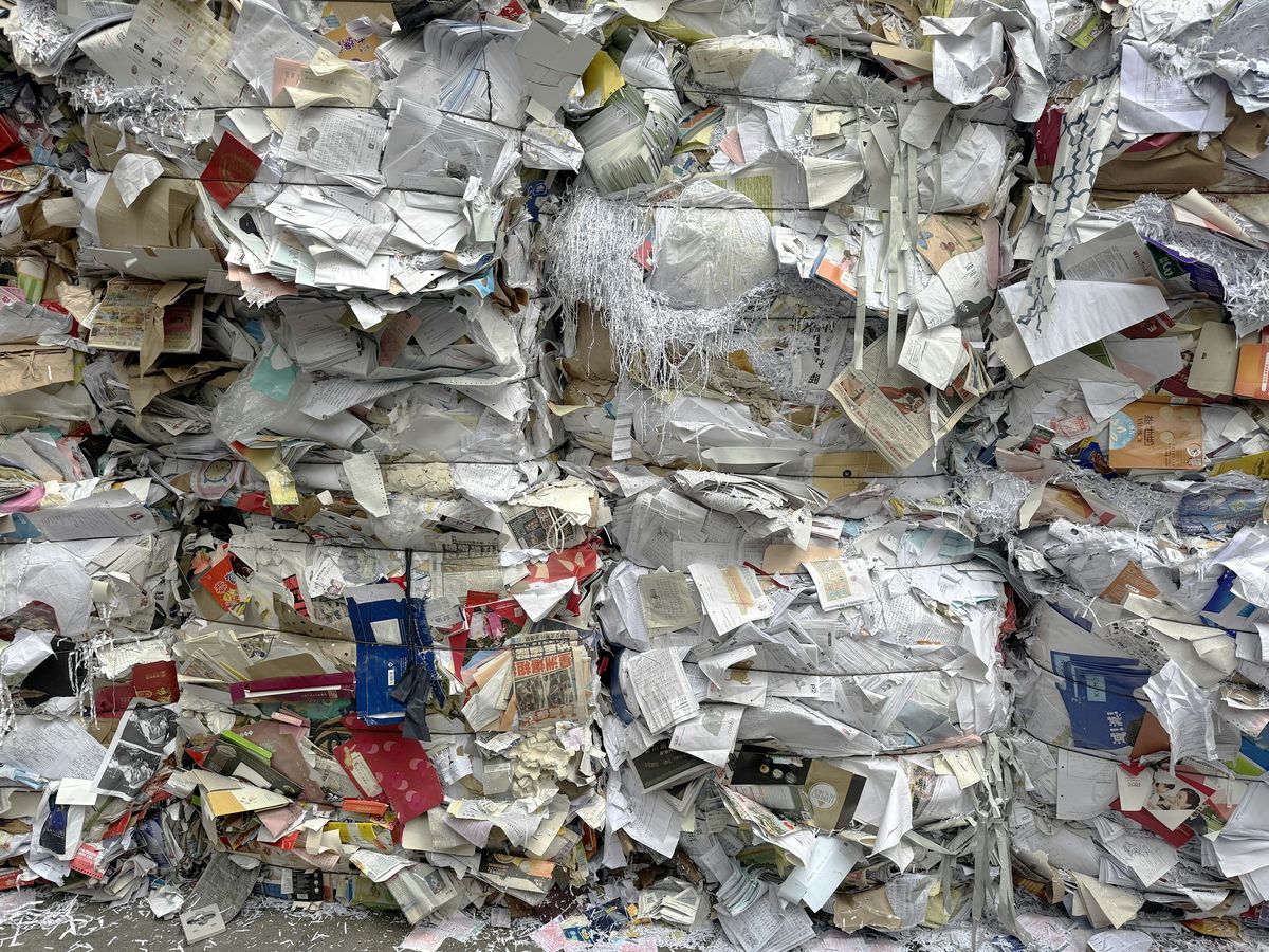 Baled recyclable material staged for documented shipment